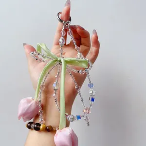 Close-up detail of the creative tulip beaded phone chain with ribbon bow and crystal beads.