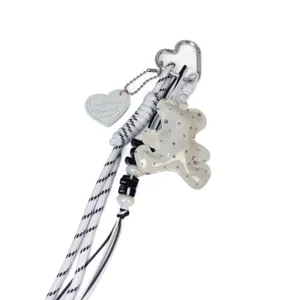 Korean style shiny bear bag charm keychain, black and white woven strap handbag pendant accessory.