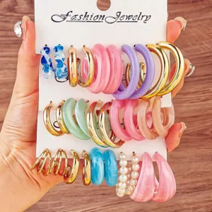 Colorful resin and metal C-shaped hoop earrings set for women fashion jewelry style.