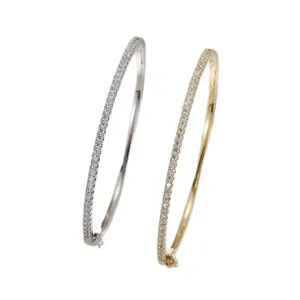 Bracelet jonc classique en zircons cubiques avec fermoir charnière en argent et or.