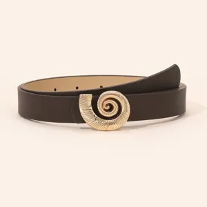 Detailed view of the stylish women belt with a unique gold spiral seashell buckle.