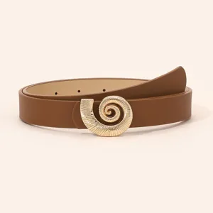 Detailed view of the stylish brown leather women's belt featuring a unique gold shell buckle.