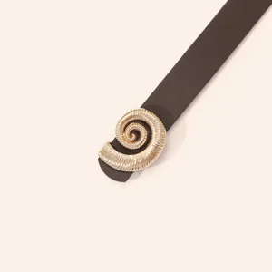 Detail shot of women fashion belt with gold spiral buckle, chic design for daily jeans wear.