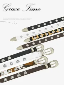 Fine ceinture en cuir pour femme avec boucle ardillon métal et œillets tendance.