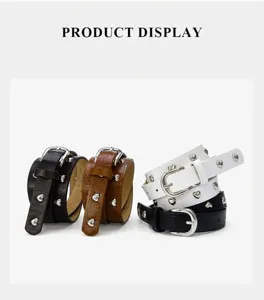 Detail shot of women crocodile pattern faux leather belt with metal heart rivets fashionable accessory