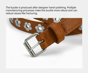 Detailed view of the brown PU leather belt featuring flower eyelets and a sturdy metal buckle.