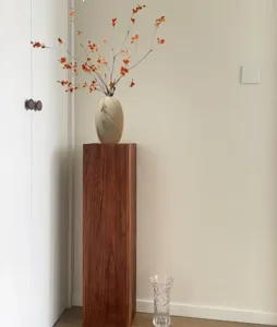 Walnut solid wood pedestal detail, Wabi-sabi style minimalist design for home decor.