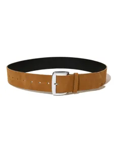 Detailed shot of a brown suede belt with a sleek silver metal pin buckle and black inner lining.