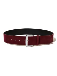 Burgundy suede wide belt detail, close-up of silver metal pin buckle and soft texture.