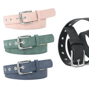 Skinny pin buckle belt detail view, multi-color casual waist belt with metallic eyelets.