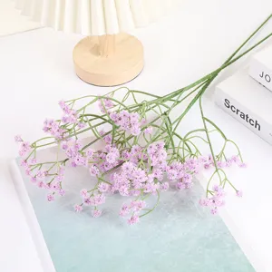 Detailed close-up of purple artificial baby's breath flowers, perfect for home decor and floral art.