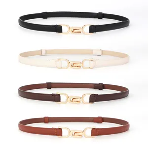 Ensemble de fines ceintures en cuir pour femmes avec boucles métalliques dorées élégantes.