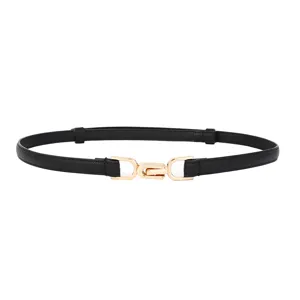 Ceinture fine noire en cuir pour femme avec boucle métallique dorée élégante et chic.