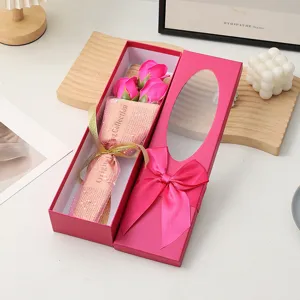Valentine gift box with 3 soap roses, elegant pink packaging and ribbon bow for special events.