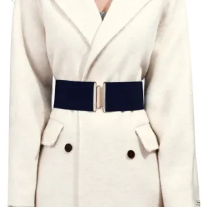 Detail shot of a women's elastic wide belt with a metal buckle, elegant and stylish accessory.