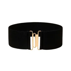 Close-up details of the black elastic waist belt featuring a shiny gold metal hook buckle.