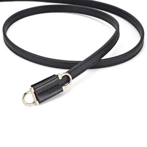 Thin black PU leather belt with gold metal rings, elegant minimalist replacement strap main view.
