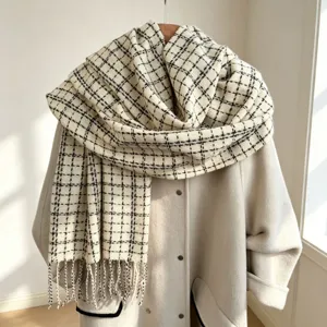 Cozy black and white plaid winter scarf with fringe detail, soft warm casual neckwear.