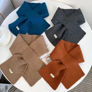 Cozy solid color cross knitted scarf for women, warm winter fashion stylish neck warmer.