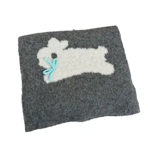 Grey knitted scarf for women with cute white rabbit and blue bow, soft winter neck warmer.