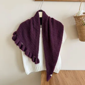 Purple knitted shawl with ruffle edge and cozy design for women's autumn and winter wear.