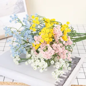 Close-up detail of colorful artificial baby's breath flower bouquet for home decor and weddings.
