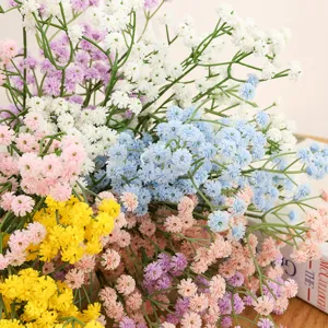 Detailed close-up of colorful artificial baby's breath flowers bouquet for room decor.