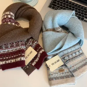 Nordic style knitted wool scarf detail view, autumn winter warm neck wear, cozy winter accessory.
