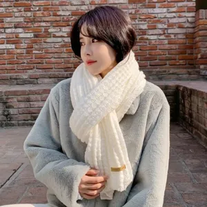 Cozy white knitted winter scarf for women, thick wool design with elegant pattern and soft warm feel.