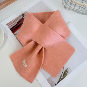 Cozy winter knitted cross scarf for women, warm soft dopamine solid color fashion neck warmer.