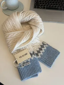 Knitted cable scarf detail, cozy winter women warm neckwear with geometric pattern.
