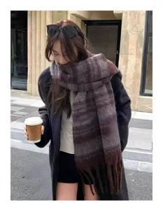 Detailed close-up of a cozy mohair wide striped winter scarf, warm and soft texture.