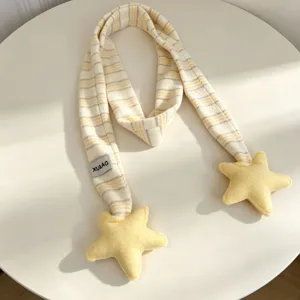 Cute plush star striped scarf detail shot, warm winter cozy neckwear for women and students.