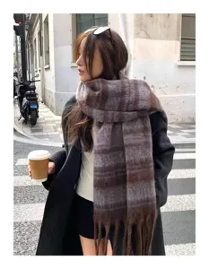 Cozy mohair blend winter scarf detail, soft texture and warm fringe design for cold days.