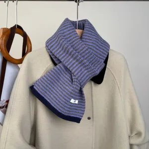 Detailed view of the retro color-block striped knitted scarf, warm and cozy winter neckwear.