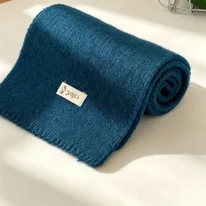 Solid color knitted winter neck warmer for women, cozy and stylish daily fashion scarf.