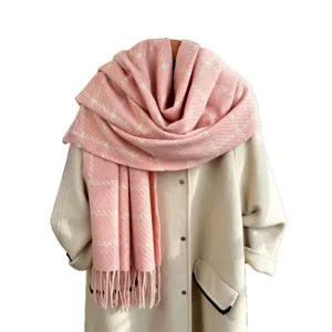 Pink plaid cashmere-feel winter scarf with metallic threads and stylish fringe design.