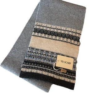 Grey Nordic knit winter scarf for women and men, warm woolen neck warmer fashion accessory.