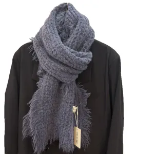 Winter thick knitted solid color scarf with fringe edges, warm and stylish neck wrap for women.