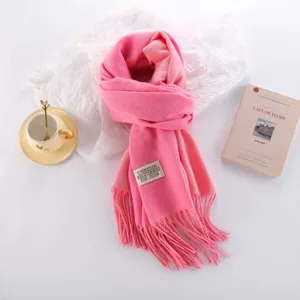 Pink cashmere feel winter scarf detail, soft warm fringed solid color cozy wrap neck scarf.