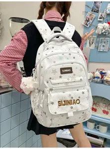 Vista dettagliata di uno zaino scolastico bianco carino con stampa di stelle e tasche.