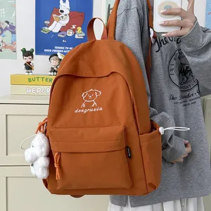 Cute cartoon dog canvas backpack for school students, simple and versatile daily casual daypack.