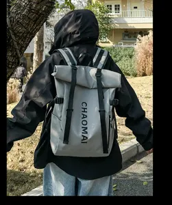 Detail view of large capacity roll top casual backpack with adjustable straps and side pockets.