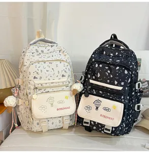 Vista dettagliata di zaino per studenti stampato carino, grande borsa da viaggio con tasche.