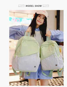 Zaino bicolore minimalista in stile coreano con tasca anteriore, borsa casual per studenti giornaliera.