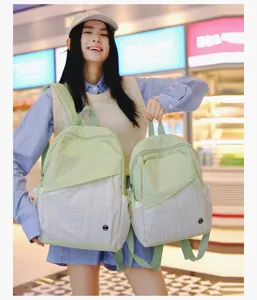 Zaino casual bicolore per uso quotidiano, borsa scolastica leggera con tasca frontale.