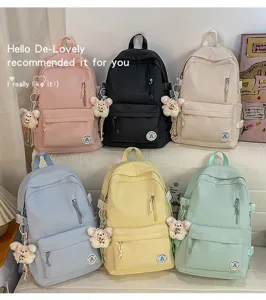 Candy color student school backpack set featuring cute bear pendant and spacious front zip pockets.