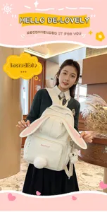 Japanese cute bunny ear backpack for school girls, sweet Harajuku style double shoulder bag.