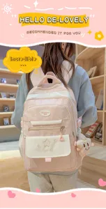 Vue de detail du sac a dos rose style japonais doux avec poche etoile et sangles.