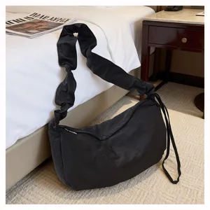 Casual black nylon hobo crossbody bag with pleated strap, large capacity daily commuter tote.